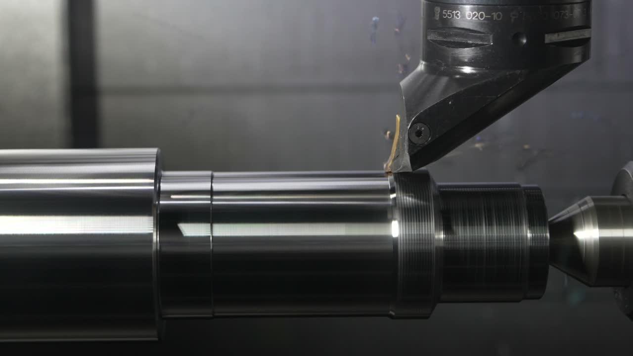 Quality engineer inspecting a precision-machined aerospace component using a coordinate measuring machine (CMM)